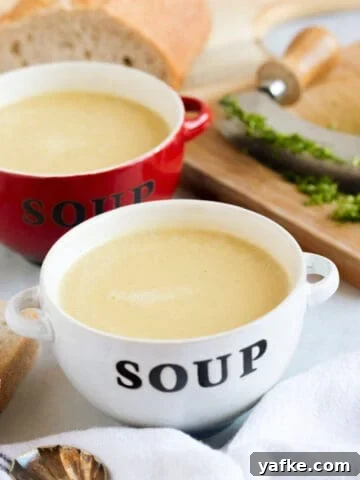 Celeriac and Bacon Soup Recipe for Soup Makers 9 Two bowls of leek and potato soup made in a soup maker.