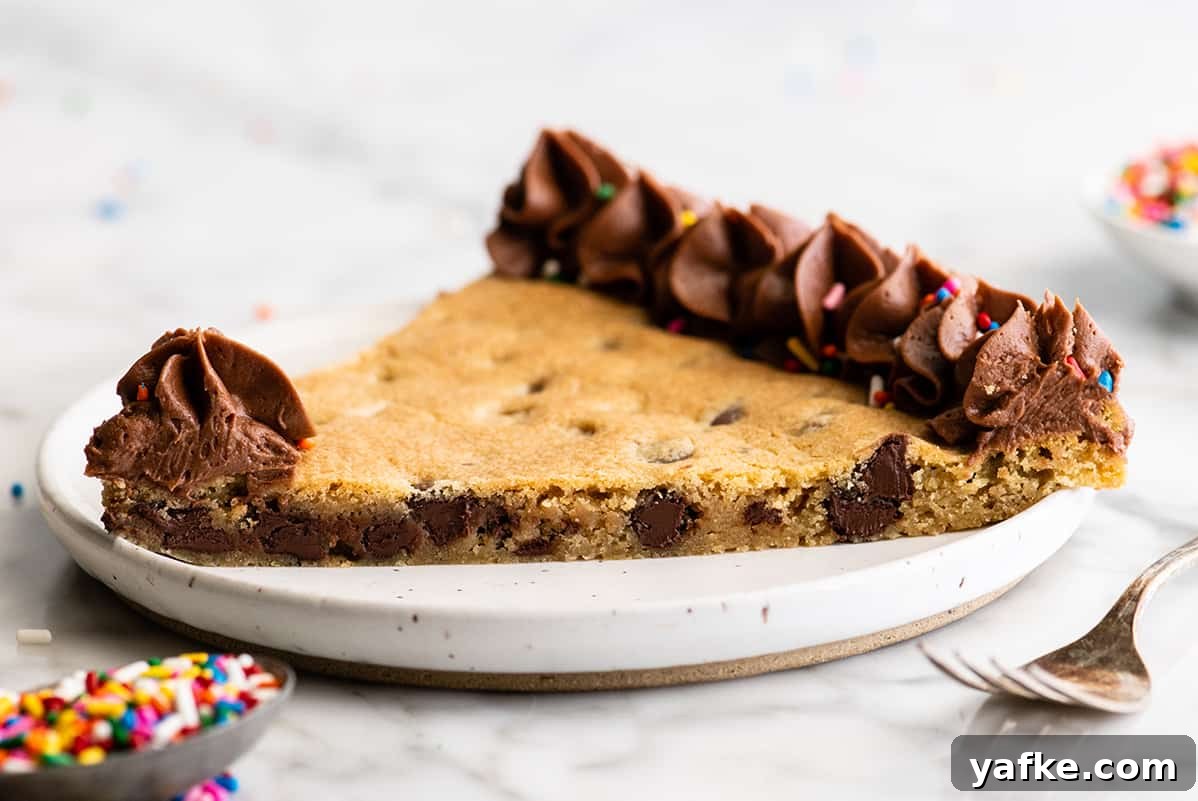 front view of a slice of this Chocolate Chip Cookie Cake Recipe