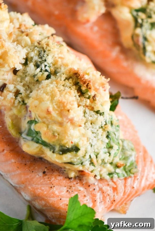 A fillet of salmon stuffed with shrimp, spinach, and cheese, topped with panko.