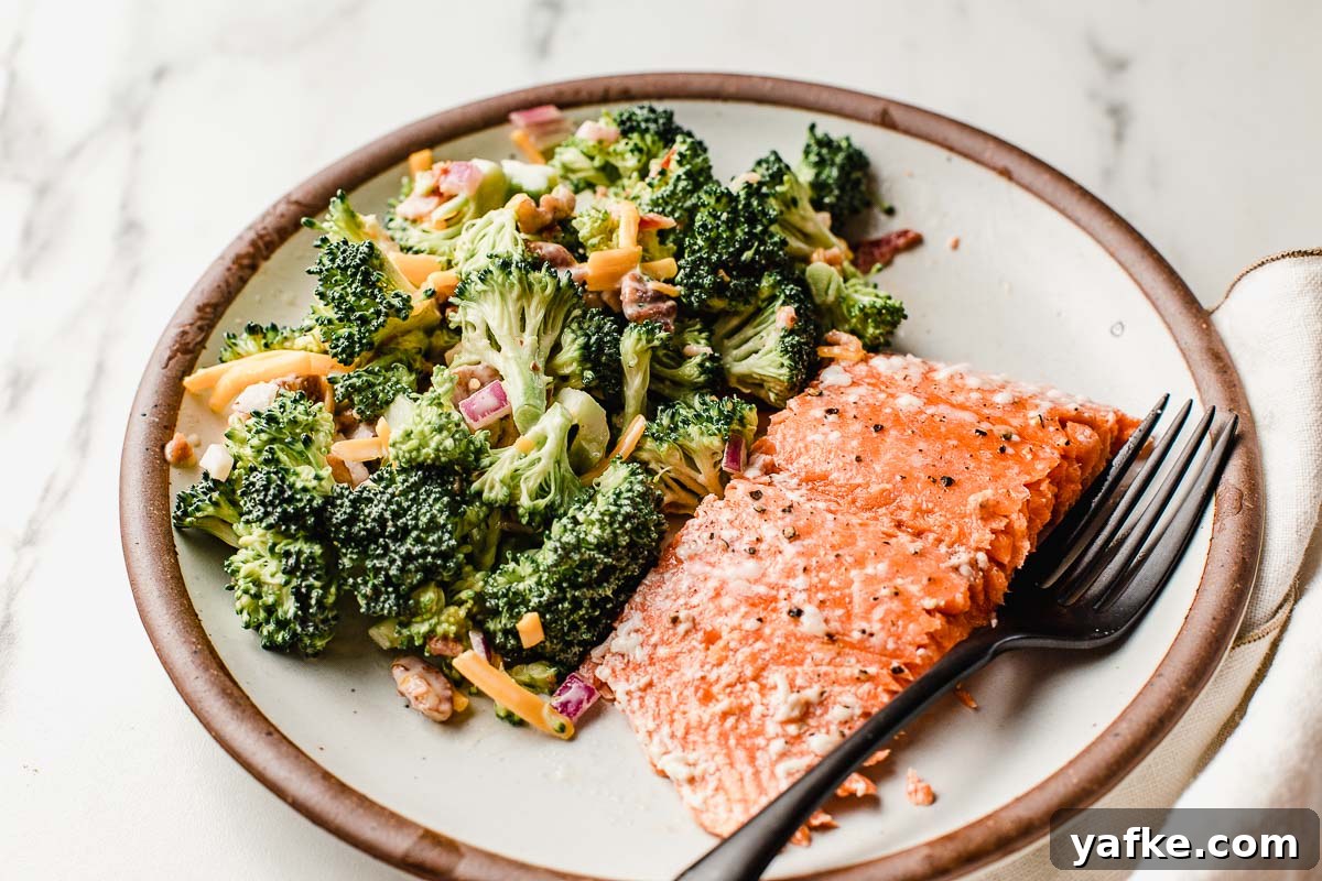 Oven-Baked Salmon with Lemon and Garlic 4 Baked salmon on a plate.