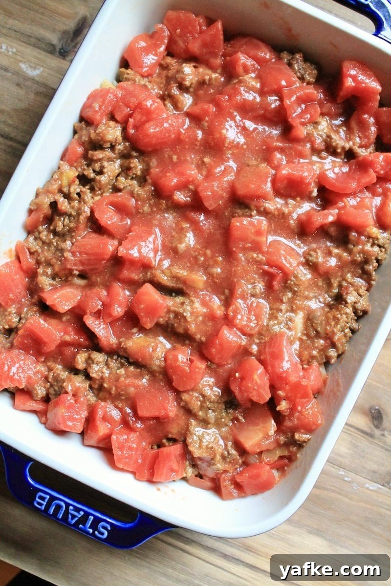 Cheesy Leftover Taco Meat Pasta Casserole 6 spread evenly in casserole dish