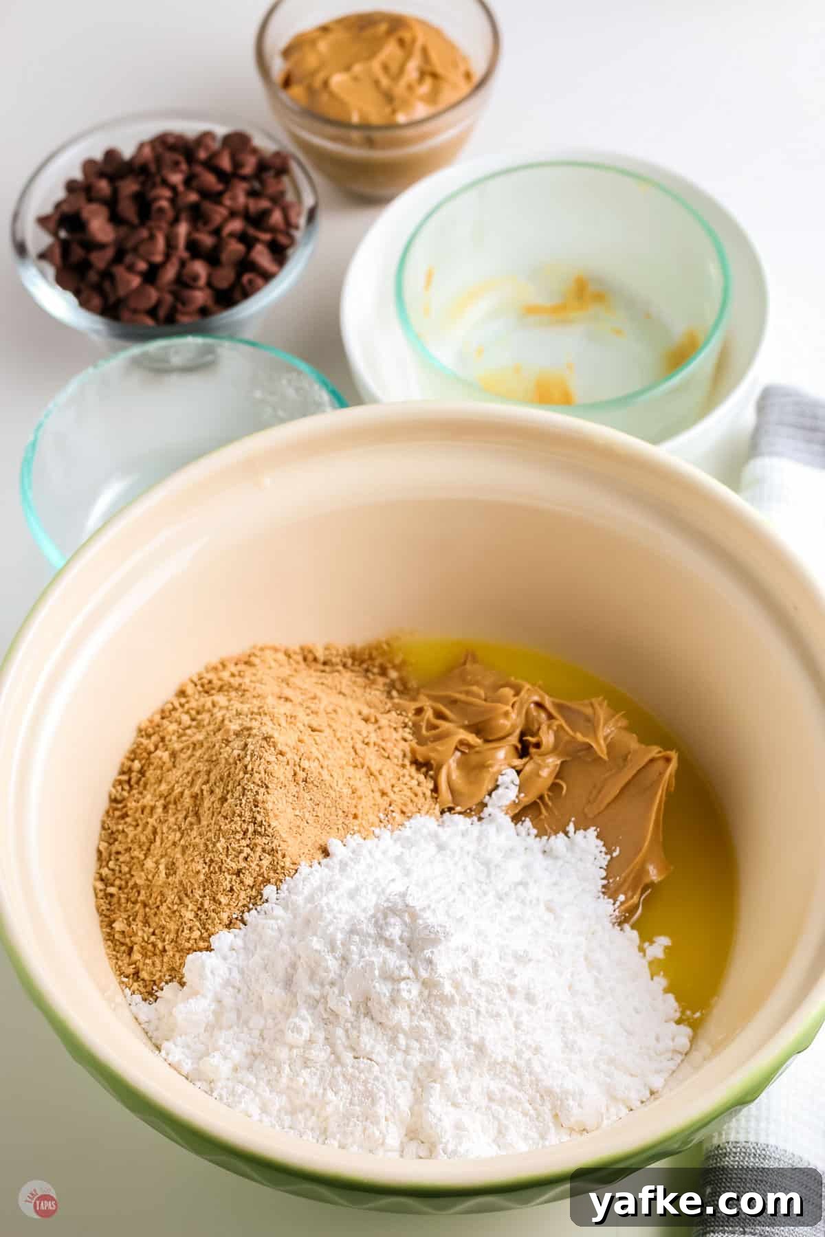 No-Bake Peanut Butter Bars Recipe 4 sugar and peanut butter in a bowl