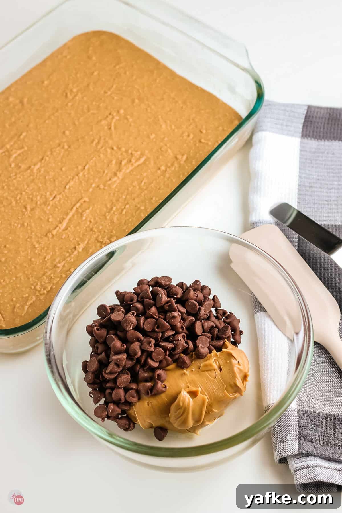 No-Bake Peanut Butter Bars Recipe 5 chocolate chips and peanut butter in a bowl