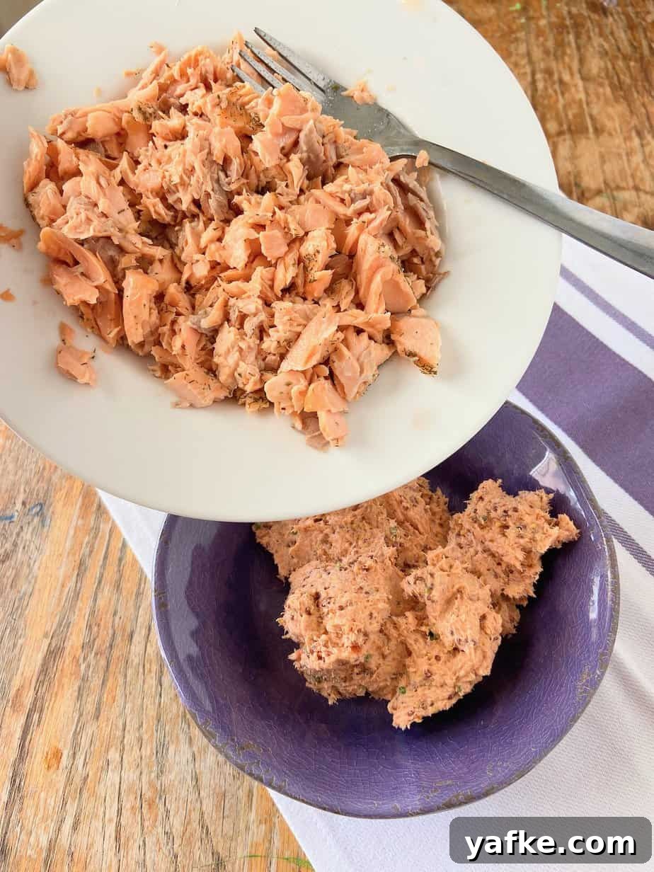 Smoked Salmon Spread with Cream Cheese, Dill and Lemon 6 Shredded salmon being added to food processor.