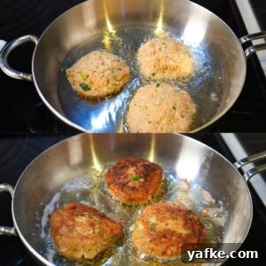 Crispy Salmon Croquettes Recipe with Lemon Dill Sauce 7 Salmon croquettes cooking in a skillet.