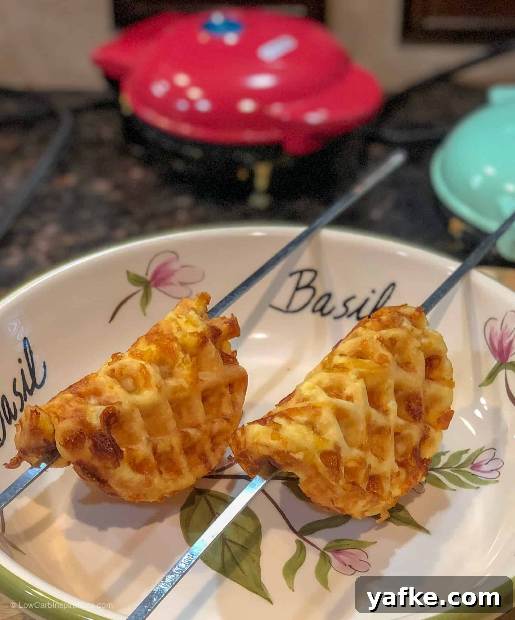 Keto Chaffle Tacos: Low-Carb Cheesy Waffle Shells 3 Keto Chaffle Tacos Recipe chaffles hanging over a bowl to shape them