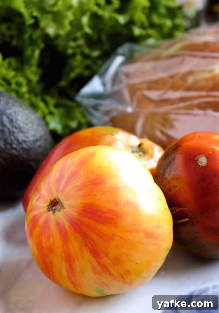 Avocado and Pesto Mayonnaise BLT Recipe 4 heirloom tomato close up