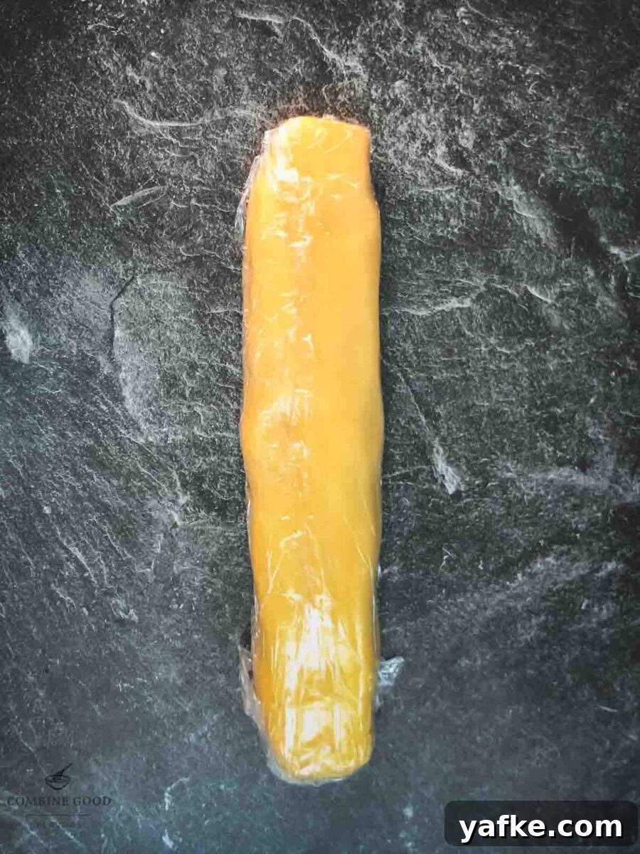 Cling film wrapped cookie dough before chilling.