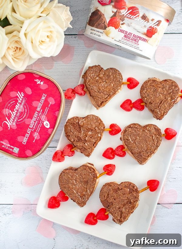 Valentine’s Day Ice Cream Sandwiches | These ice cream sandwiches made with Hudsonville Ice Cream and boxed brownie mix are a perfect Valentine’s Day Dessert. Valentine’s Day Ice Cream Sandwiches | These ice cream sandwiches made with Hudsonville Ice Cream and boxed brownie mix are a perfect Valentine’s Day Dessert.