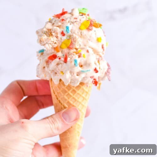hand holding ice cream cone.