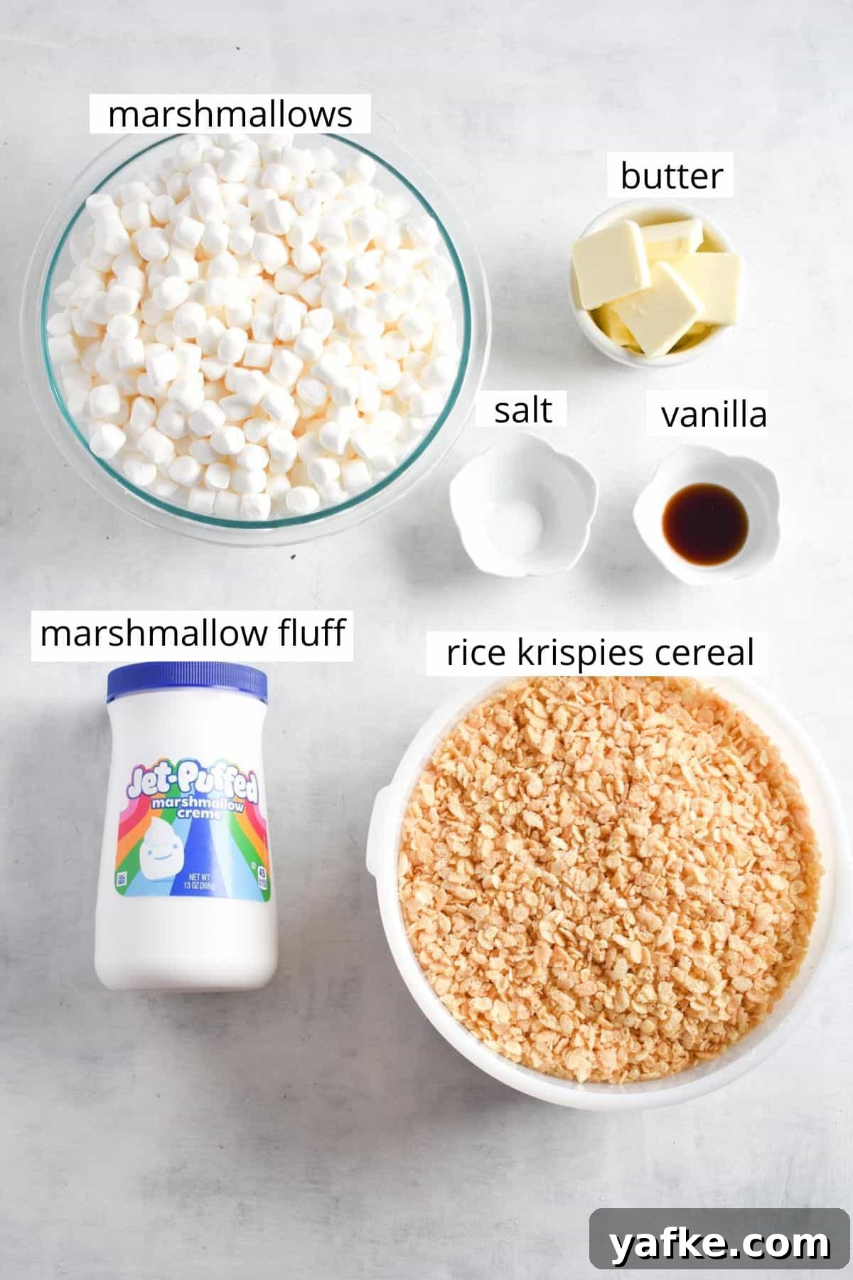 Rice Krispie Treats with Marshmallow Fluff 3 ingredients for recipe laid out.