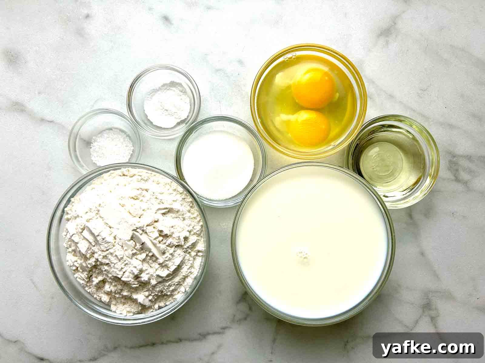 Authentic Swedish Pancake Recipe: Thin Crepe-Style Pancakes 3 ingredients prepped in bowls.