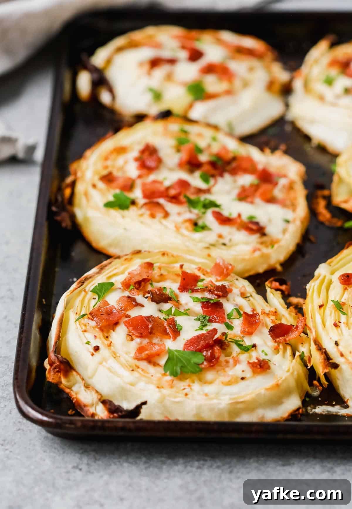 Crispy Roasted Cabbage Steaks with Garlic and Parmesan 4 slices of roasted cabbage steak with toppings