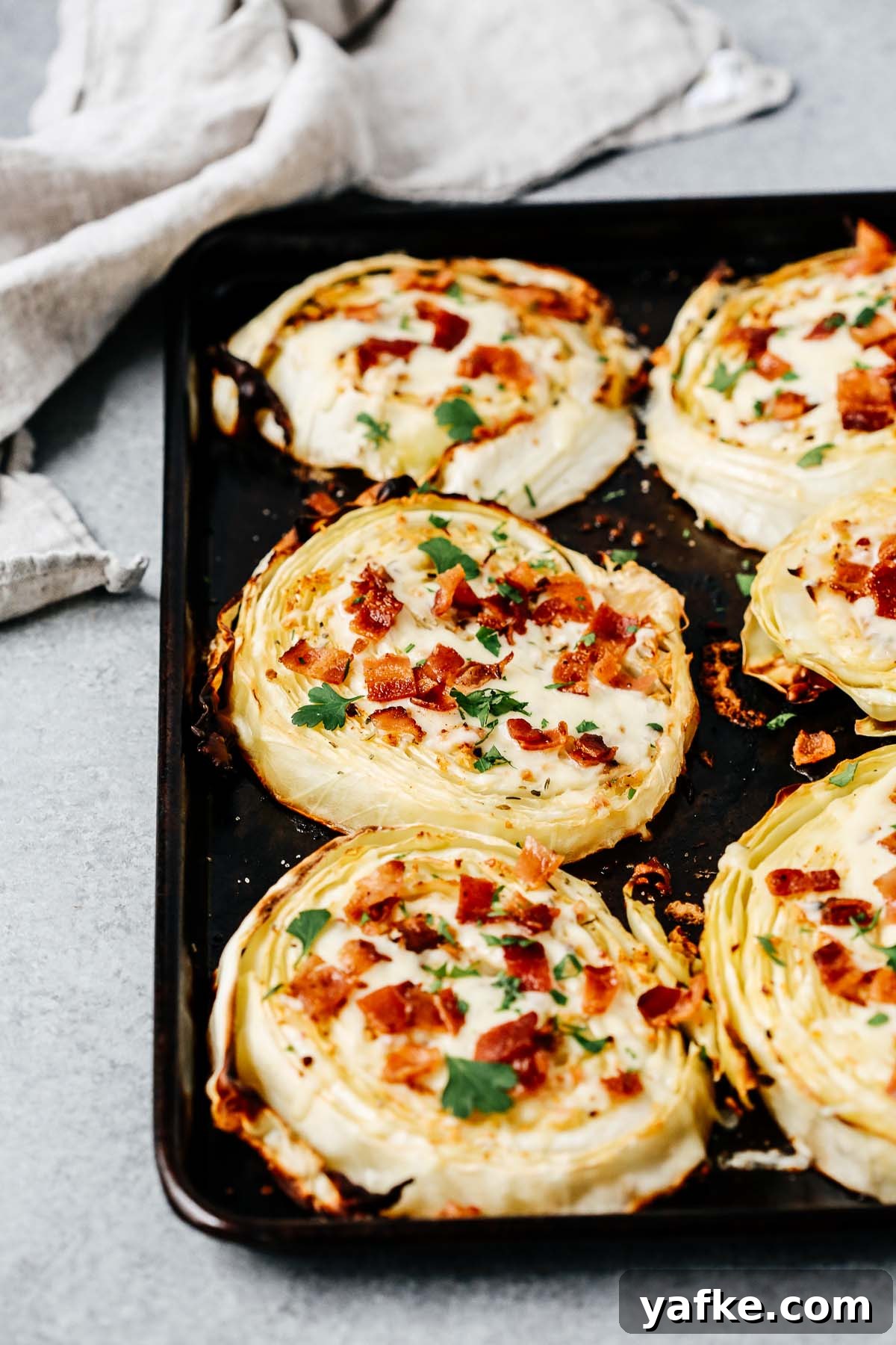 Crispy Roasted Cabbage Steaks with Garlic and Parmesan 5 cabbage steaks with bacon and cheese