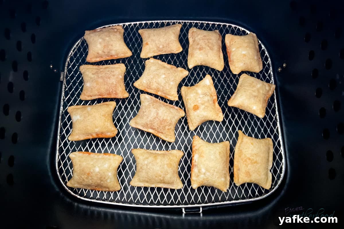 Crispy Homemade Air Fryer Pizza Rolls 4 14 frozen rolls lightly greased in basket