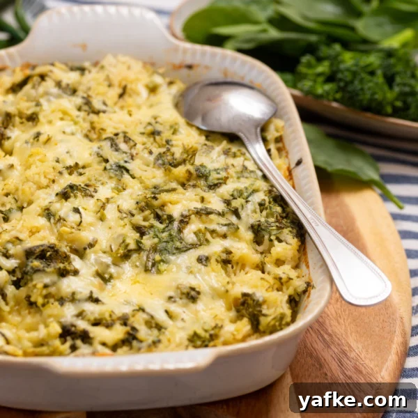 Baked green rice casserole in a casserole dish ready to serve.