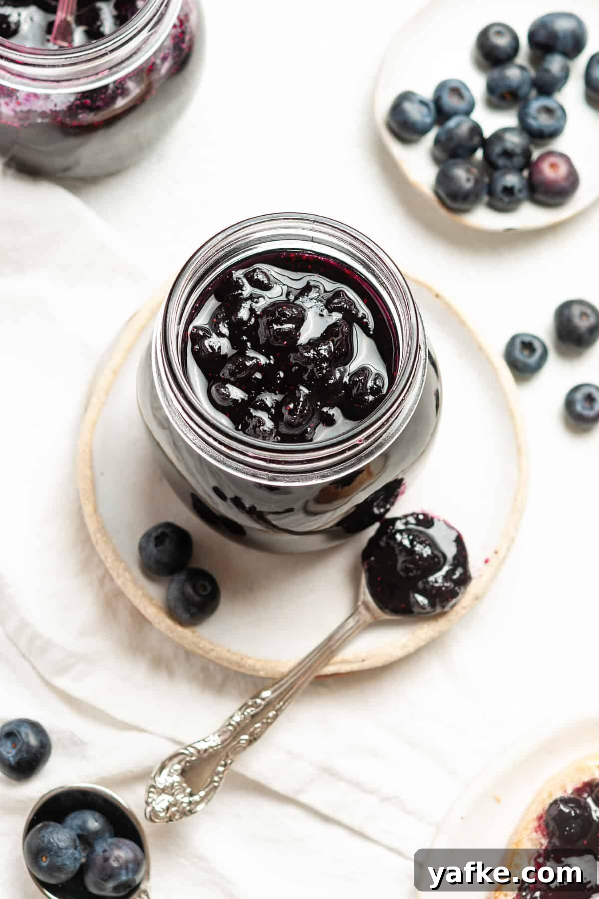 25 Homemade Edible Gift Ideas for Any Occasion 20 Overhead shot of open jar of jam