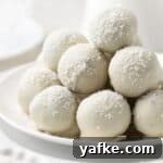 25 Homemade Edible Gift Ideas for Any Occasion 23 Round white plate with a stack of Coconut Truffles