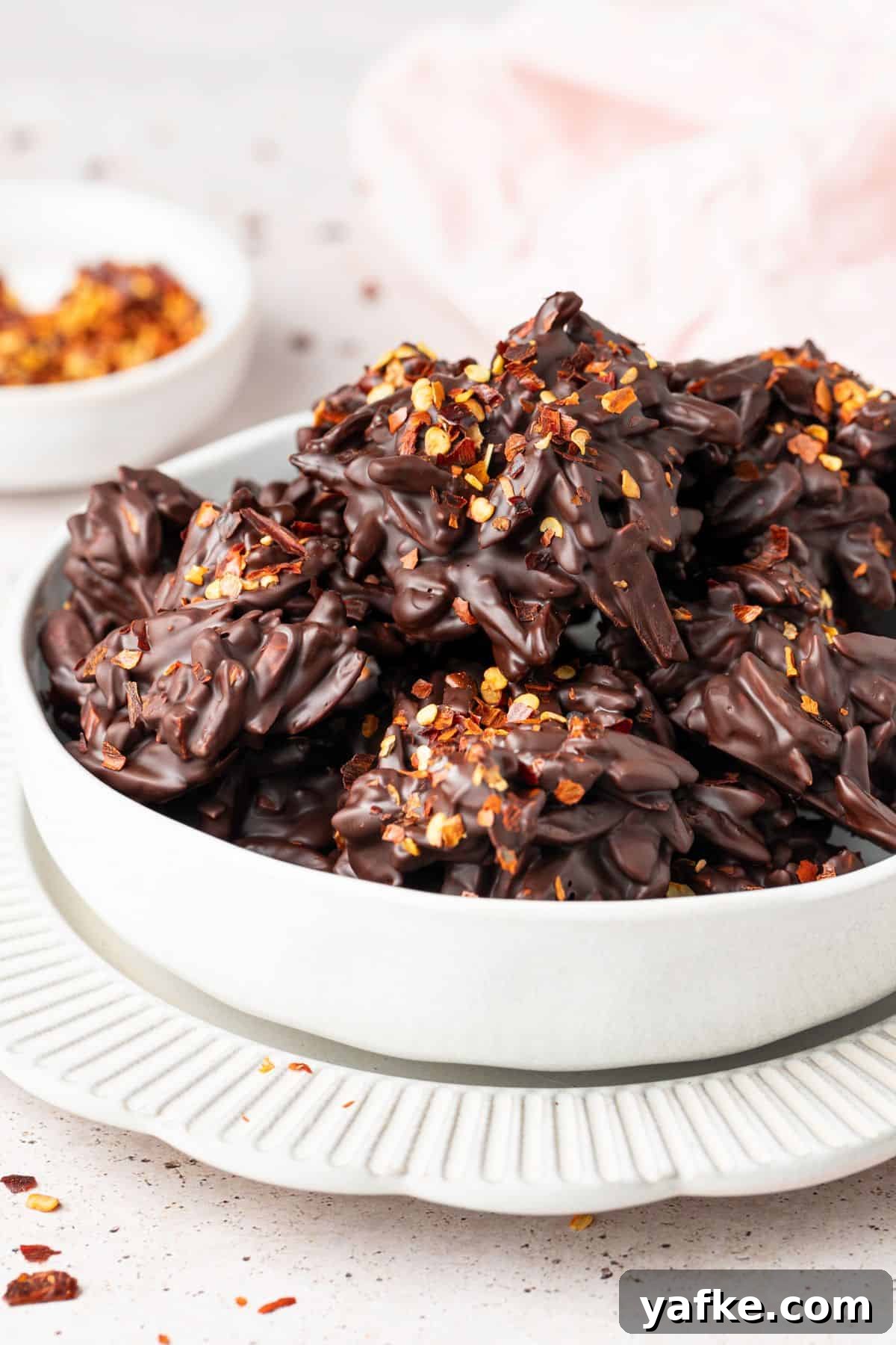 25 Homemade Edible Gift Ideas for Any Occasion 30 Round white bowl of Chilli Chocolate Clusters