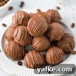 25 Homemade Edible Gift Ideas for Any Occasion 33 Plate of truffles sprinkled with some coffee beans