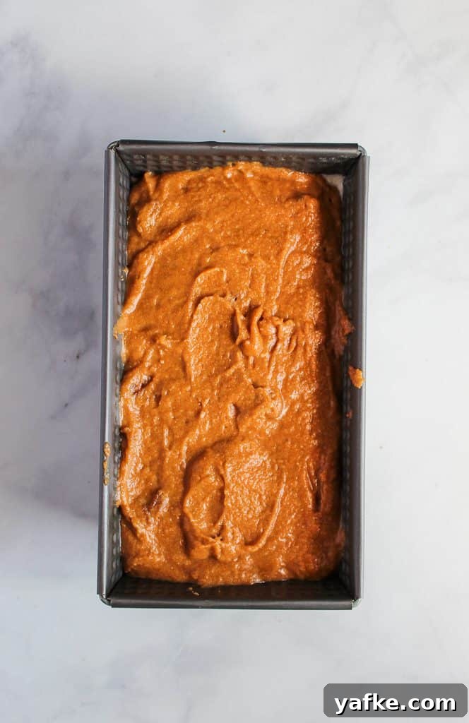 Moist Dairy-Free Gluten-Free Pumpkin Bread Recipe 5 gluten free pumpkin bread batter in a baking pan.