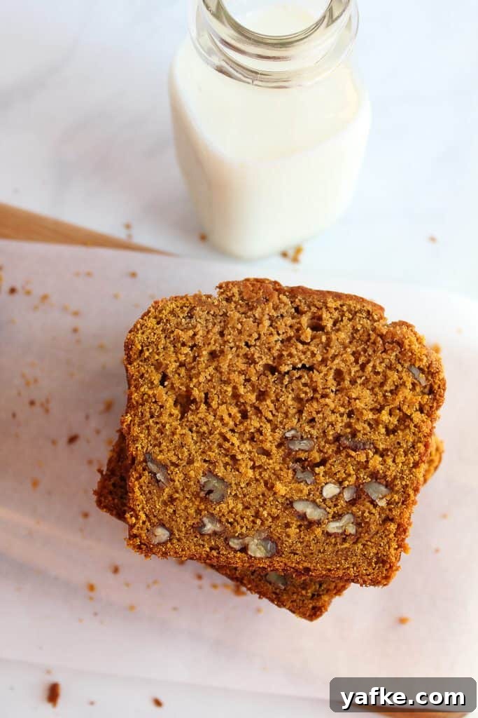 Moist Dairy-Free Gluten-Free Pumpkin Bread Recipe 7 gluten free pumpkin bread sliced in a stack.