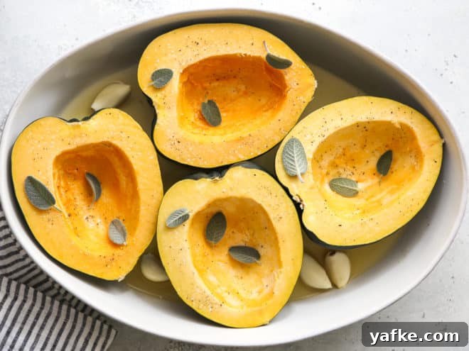 Oven Roasted Acorn Squash with Sage Cream Sauce Recipe 4 acorn squash in dish ready for roasting