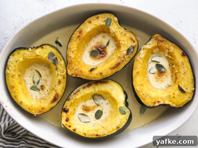 Oven Roasted Acorn Squash with Sage Cream Sauce Recipe 5 roasted acorn squash with sage cream sauce in baking dish