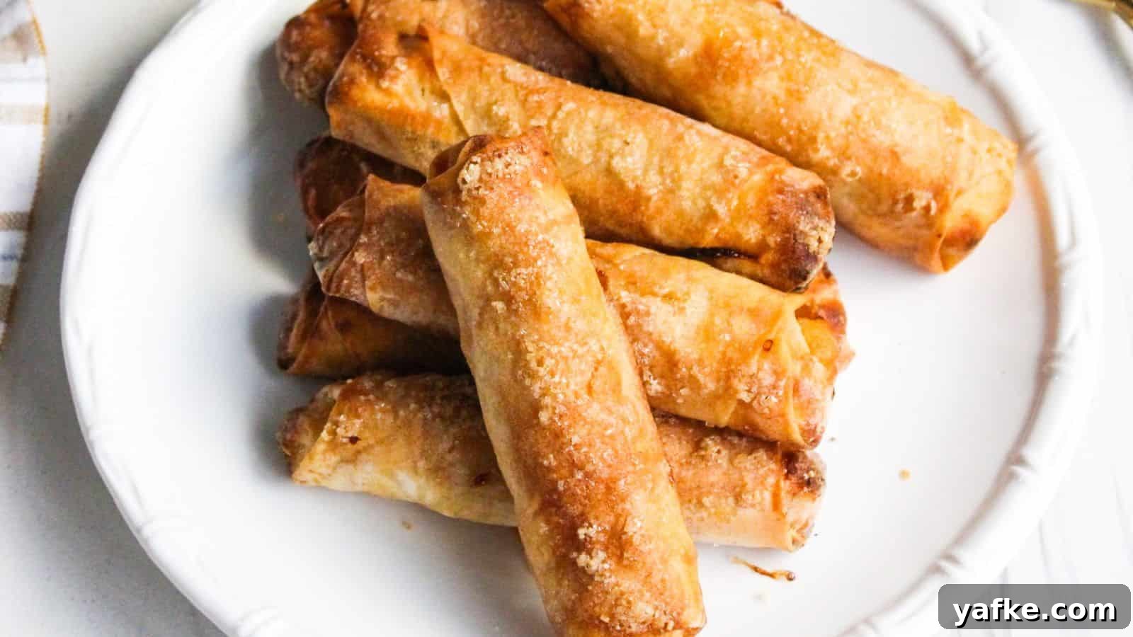 11 Air Fryer Dessert Recipes That Will Make You Ditch the Oven 8 A plate of freshly cooked Filipino banana turon lumpia spring rolls.