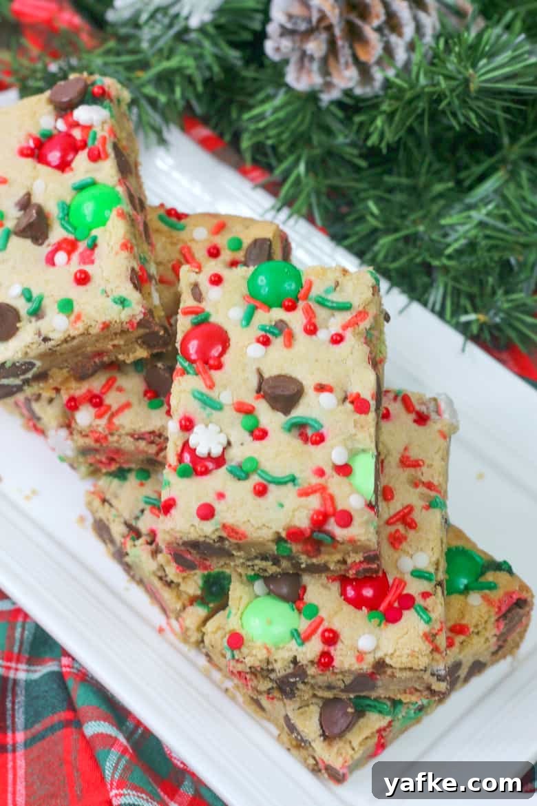 Chewy Christmas Cookie Bars Recipe with Festive Sprinkles 4 Overhead view of M&M Holiday Cookie Bars with sprinkles.