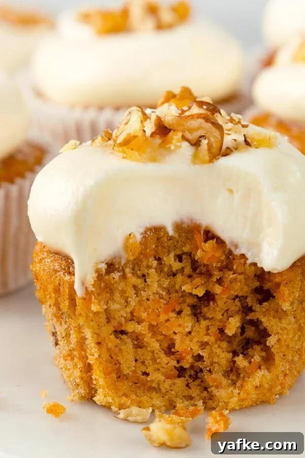 Carrot cake cupcakes bitten.