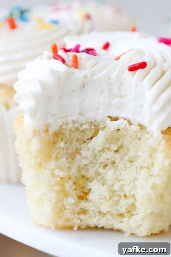 soft moist vanilla cupcakes with fluffy frosting.