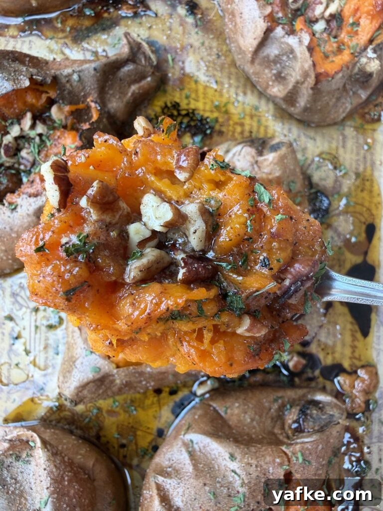 Baked Sweet Potatoes with Savory Maple Butter Recipe 13 A spoonful of the loaded sweet potato