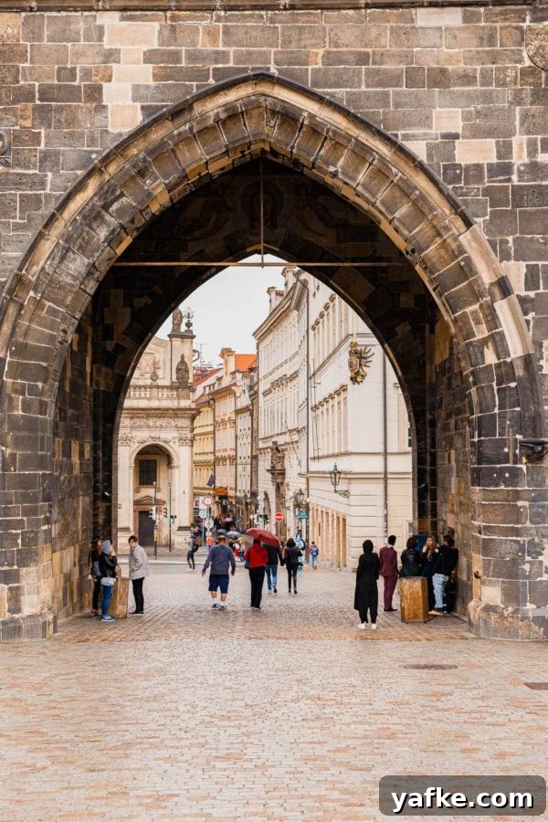 Prague Travel Guide - with recommendations on things to do in Prague, where to stay, and where to eat. #travel #prague #travelguide Charles Bridge Arch Prague