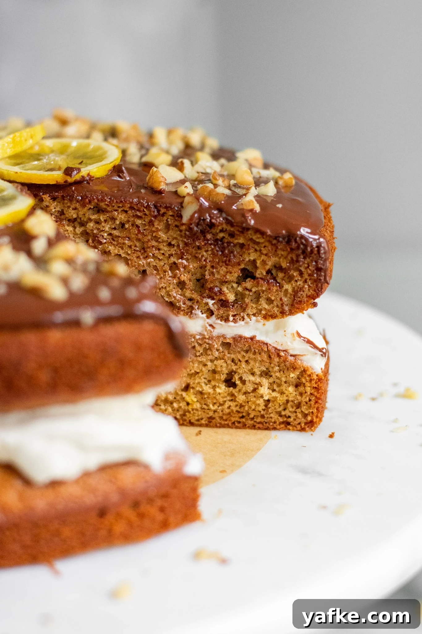 Traditional Danish Honey Cake (Honningkage) Recipe 2 A honey cake with buttercream topped with chocolate, walnuts, and candied lemon.