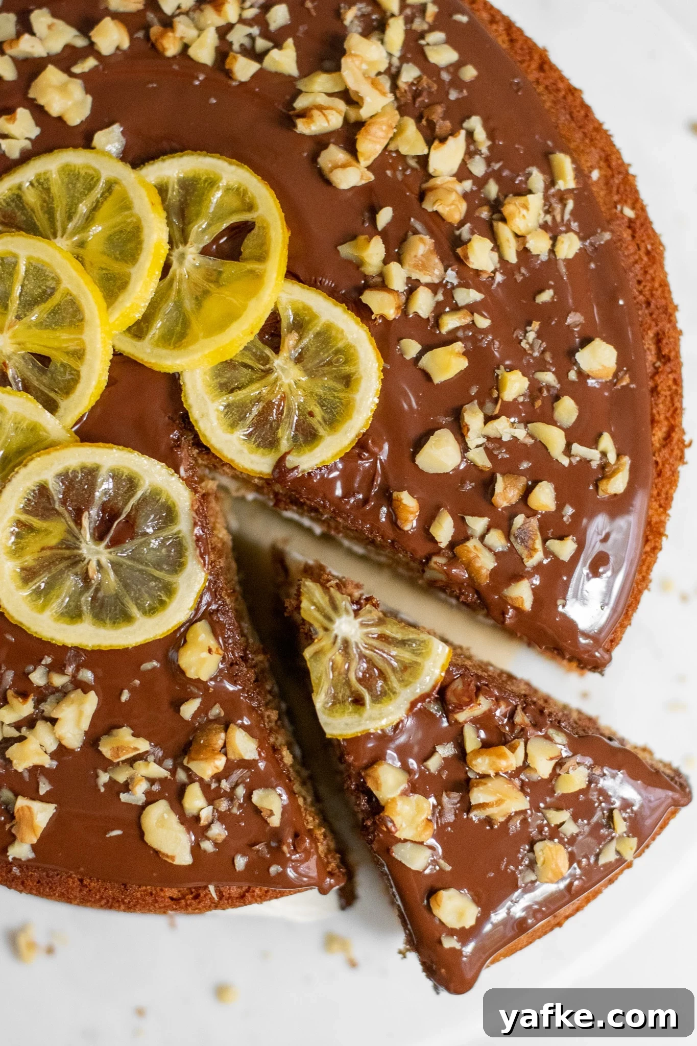 Traditional Danish Honey Cake (Honningkage) Recipe 11 A honey cake with buttercream topped with chocolate, walnuts, and candied lemon.
