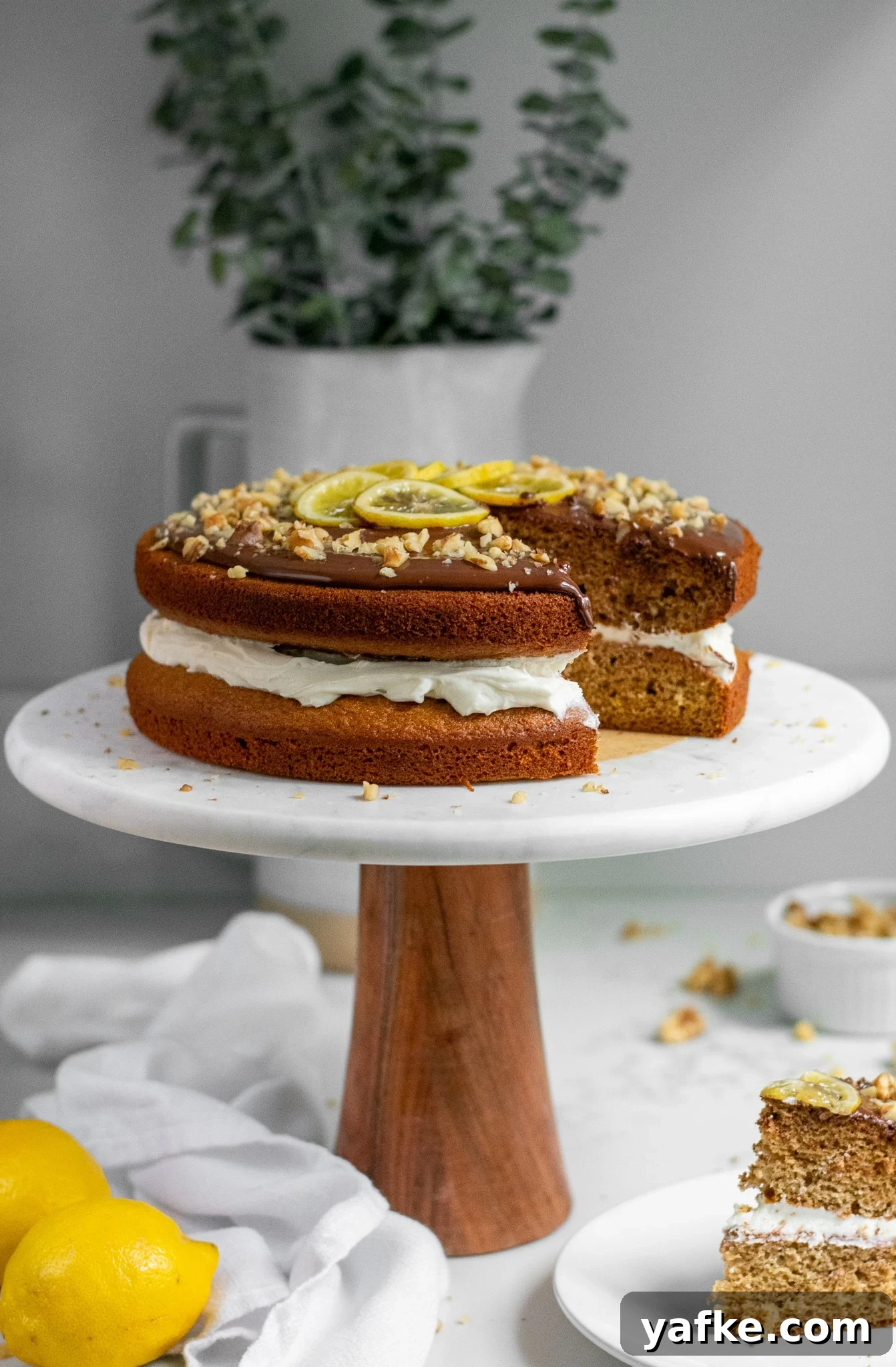 Traditional Danish Honey Cake (Honningkage) Recipe 12 A honey cake with buttercream topped with chocolate, walnuts, and candied lemon.