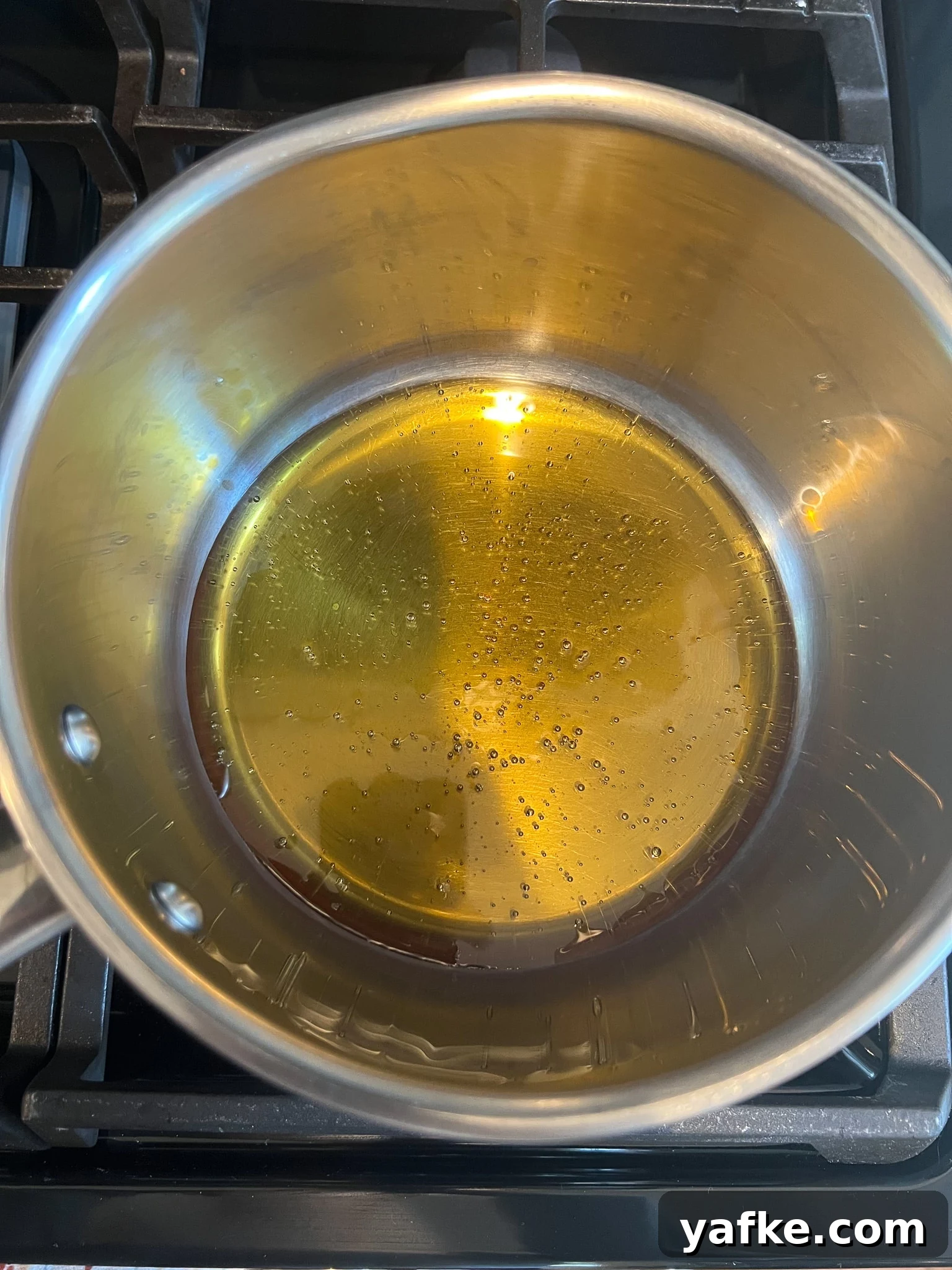 Traditional Danish Honey Cake (Honningkage) Recipe 14 Honey heated up over the stove.