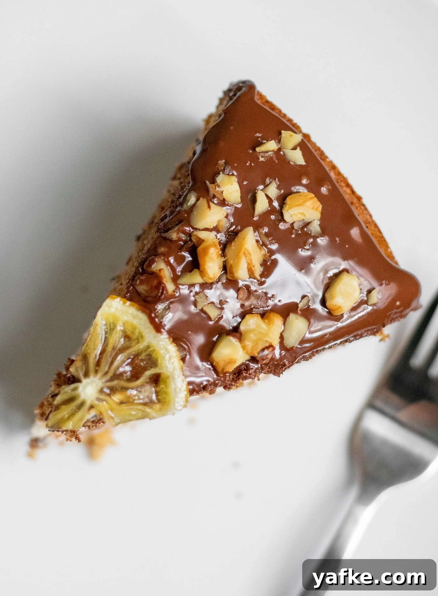 Traditional Danish Honey Cake (Honningkage) Recipe 3 A honey cake with buttercream topped with chocolate, walnuts, and candied lemon.