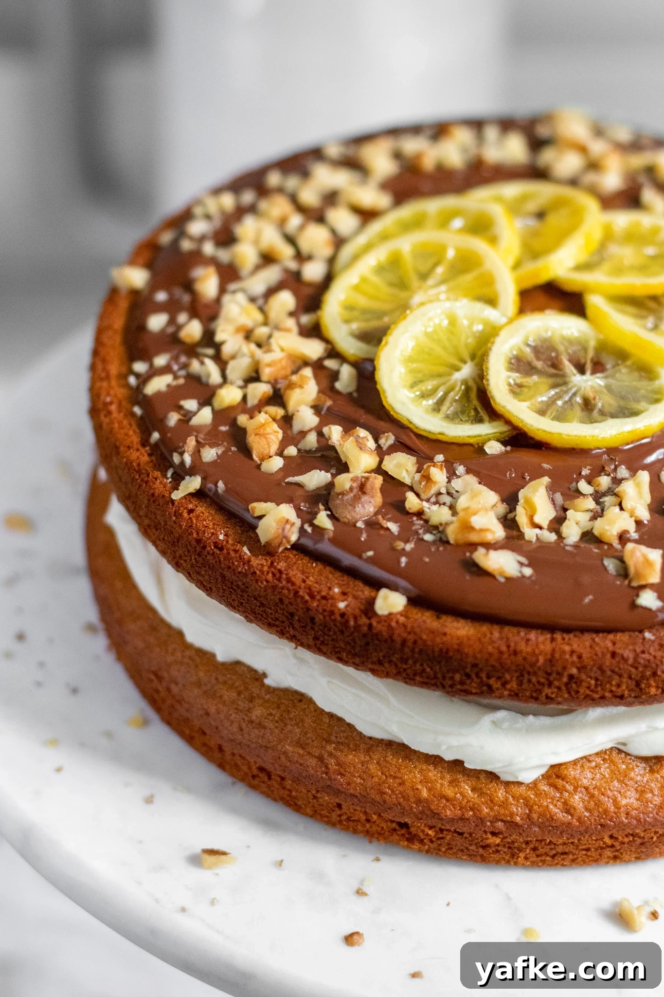 Traditional Danish Honey Cake (Honningkage) Recipe 5 A honey cake with buttercream topped with chocolate, walnuts, and candied lemon.