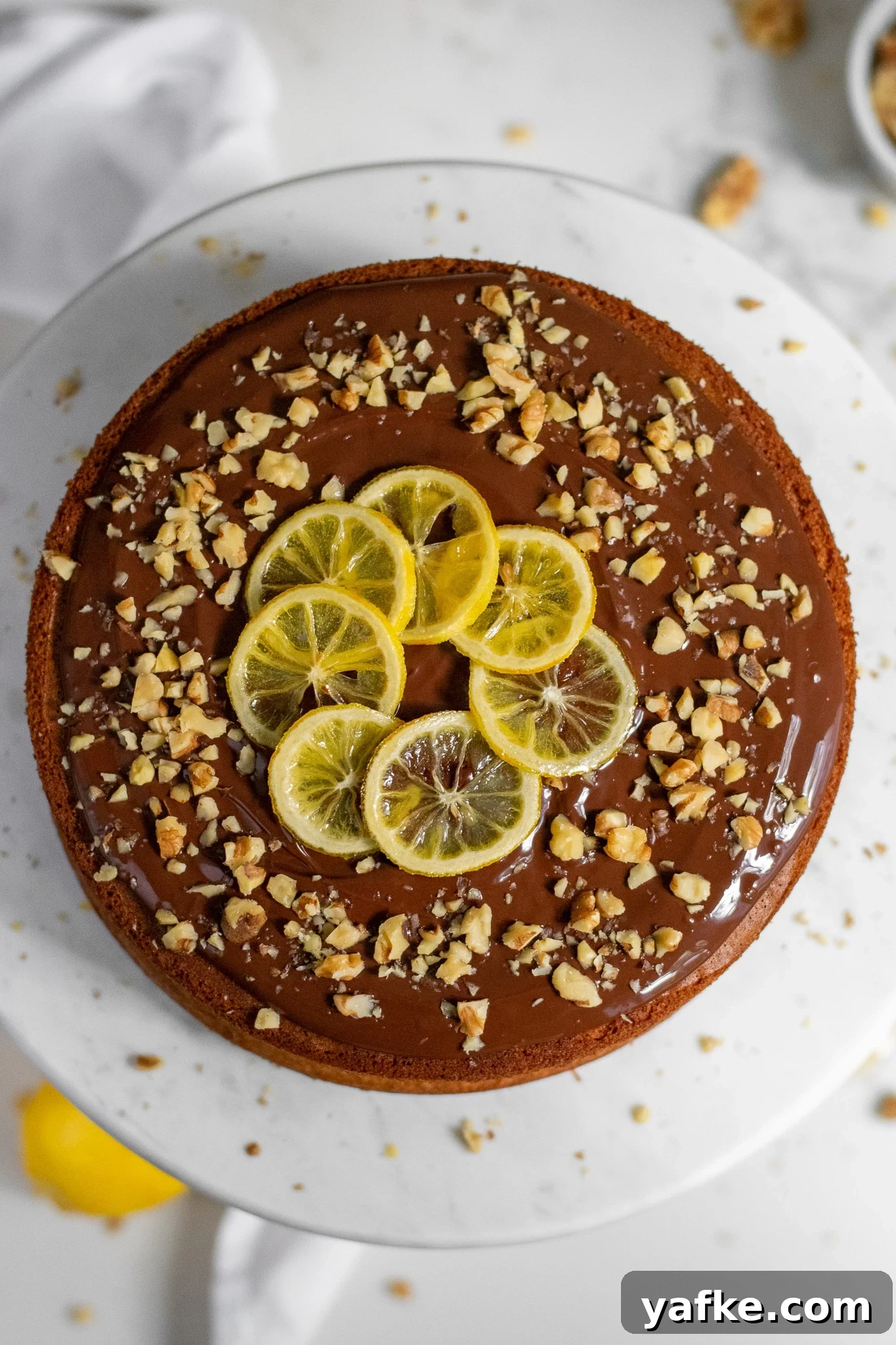 Traditional Danish Honey Cake (Honningkage) Recipe 6 A honey cake with buttercream topped with chocolate, walnuts, and candied lemon.
