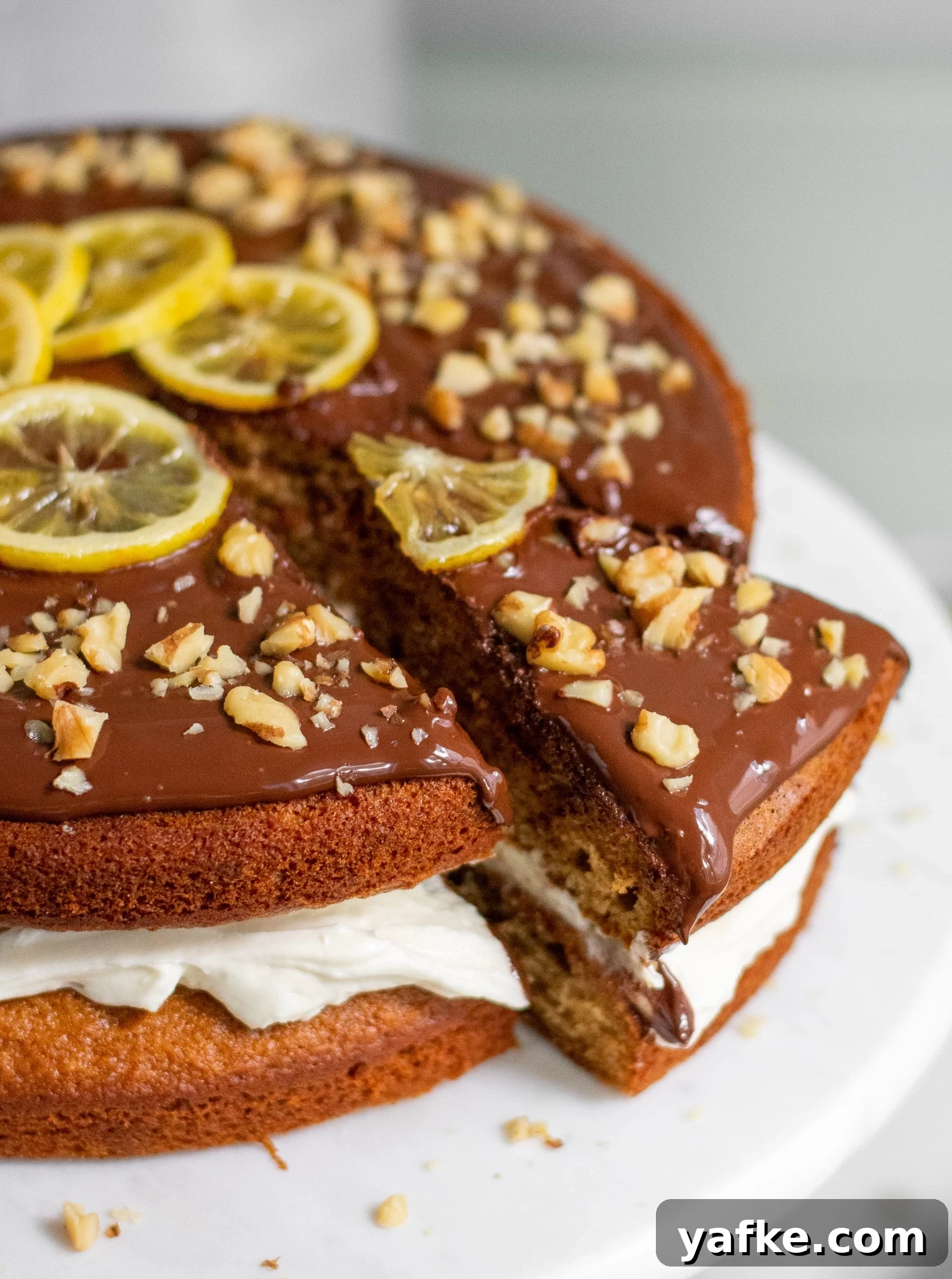 Traditional Danish Honey Cake (Honningkage) Recipe 10 A honey cake with buttercream topped with chocolate, walnuts, and candied lemon.