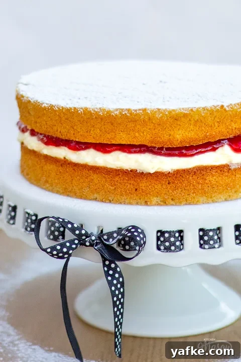 Victoria sponge cake on a cake stand