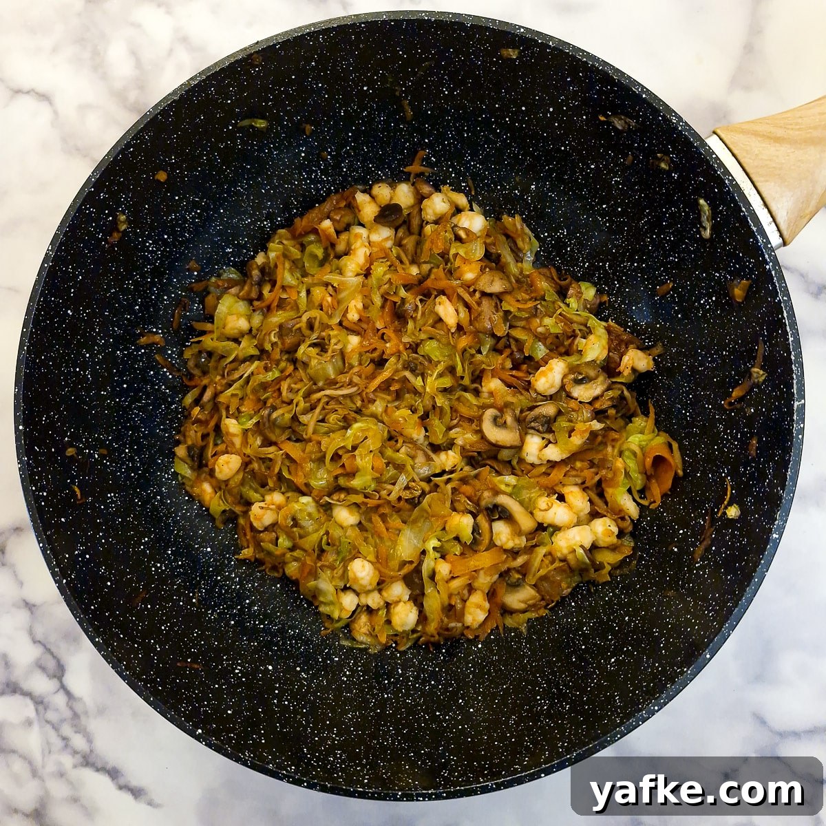 Crispy Prawn Spring Rolls Recipe with Sweet Chili Dip 7 Prawn spring roll filling combined in a frying pan.