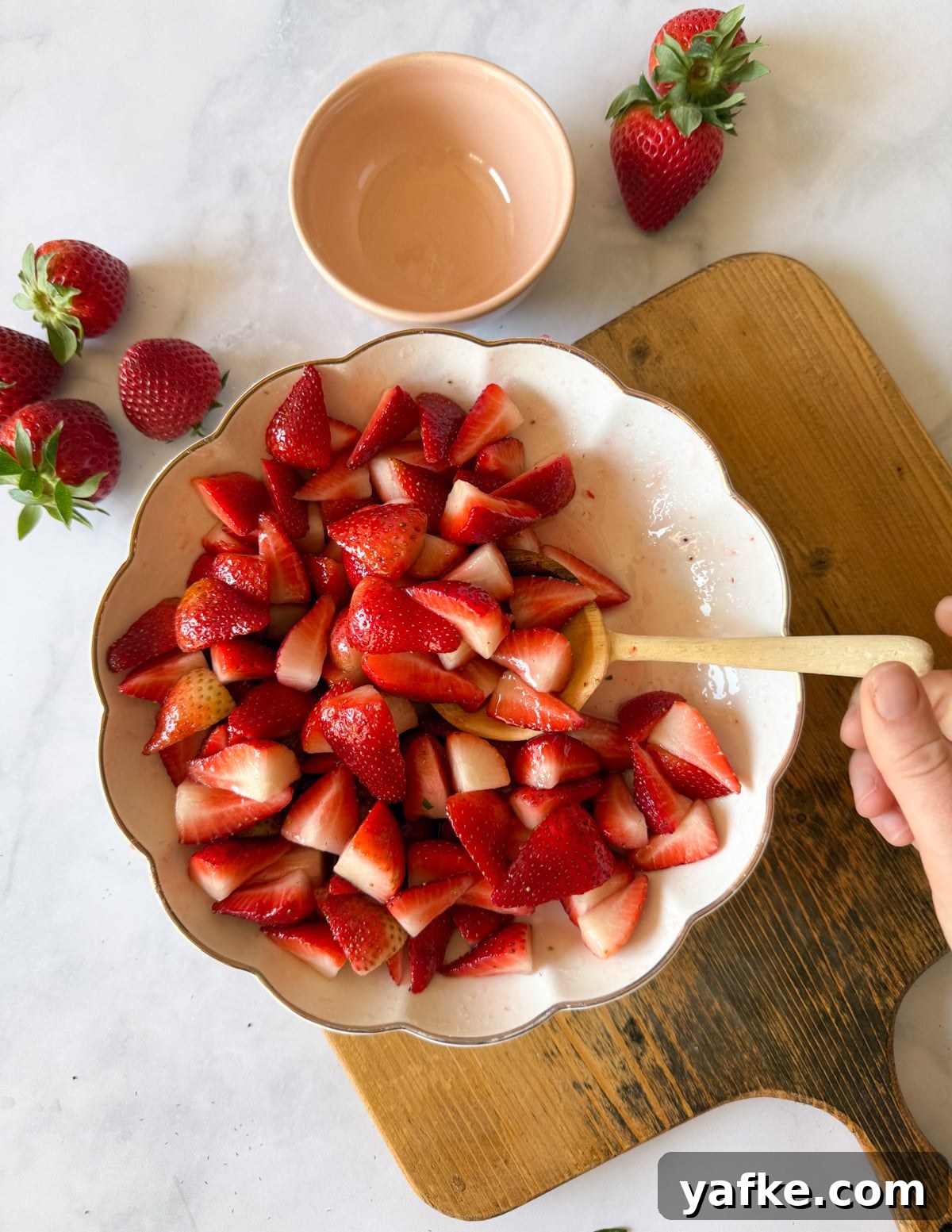 Macerated Strawberries Recipe with Lemon and Vanilla 12 a bowl of sugared strawberries