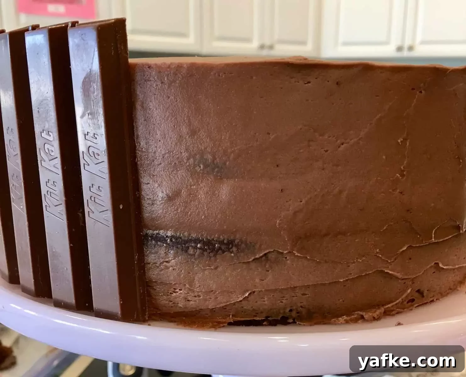 Peppa Pig Kit Kat Birthday Cake Recipe 4 chocolate cake with Kit Kat bars stuck along of the side