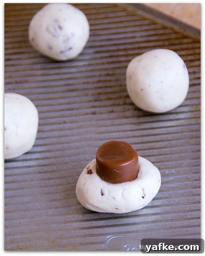 Caramel-Filled Snowball Cookies 2 carmel-surprise-cookies-3