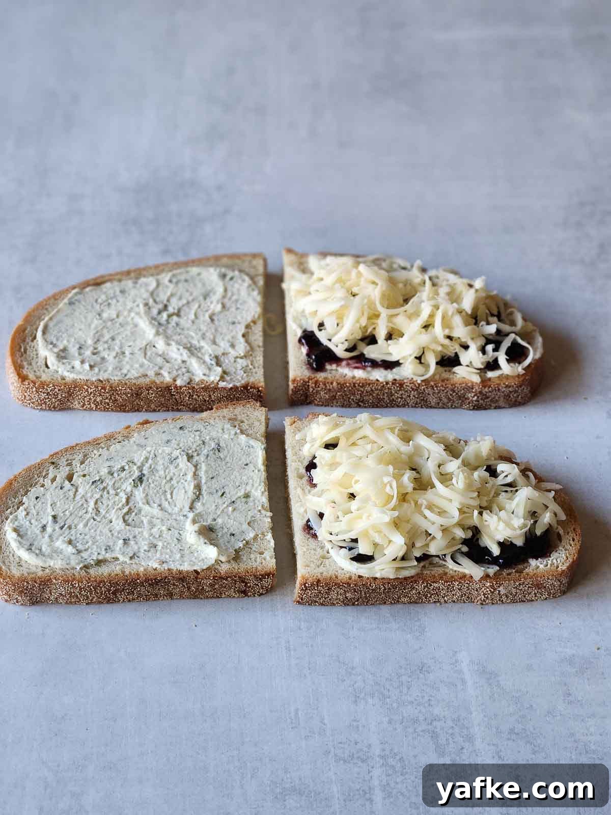 Boursin and Blackberry Grilled Cheese Sandwich 5 Four slices of bread with ingredients piled on top for grilled cheese.