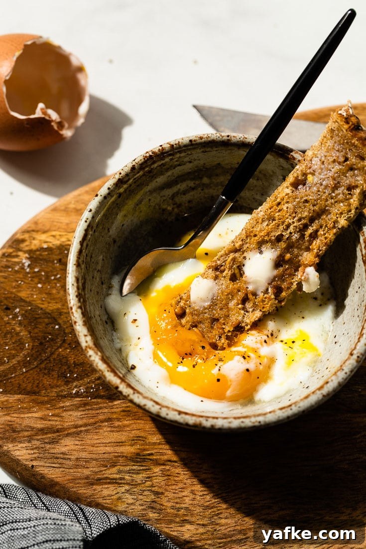 How to Make Silky Sous Vide Poached Eggs 3 sous vide poached eggs with toast close up