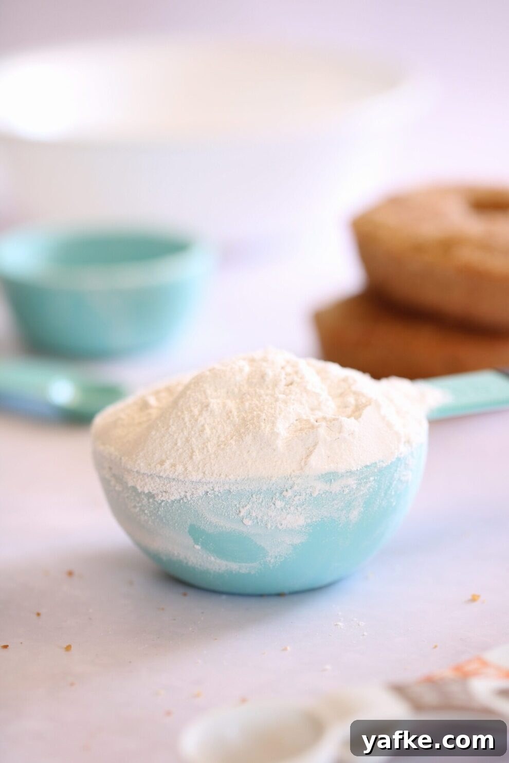 Measure flour by spooning and sweeping or leveling. Never pack it into the measuring cup.